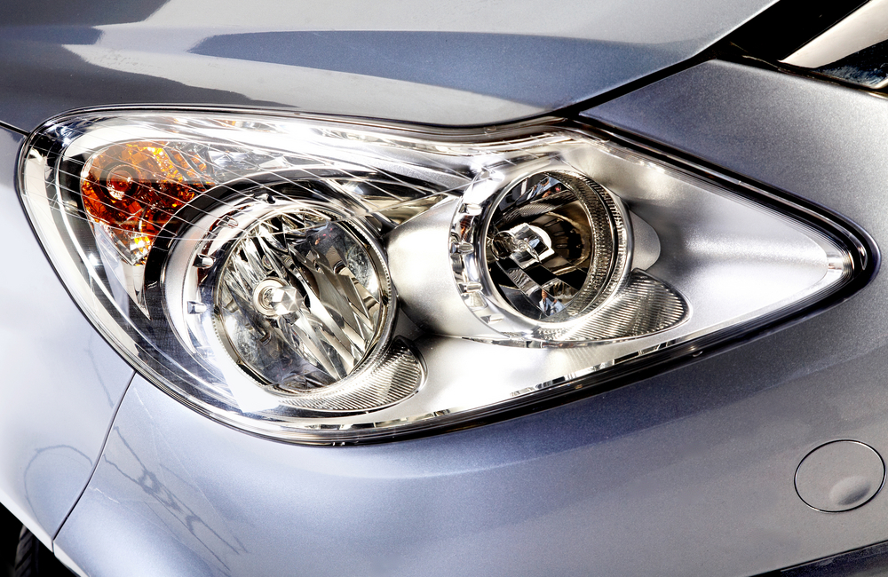 car head lights in silver - closeup in studio